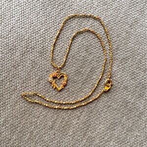 Rose and yellow gold heart charm